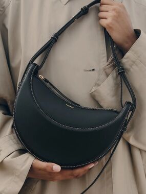 Polène Black Crescent Crossbody with White Stitching